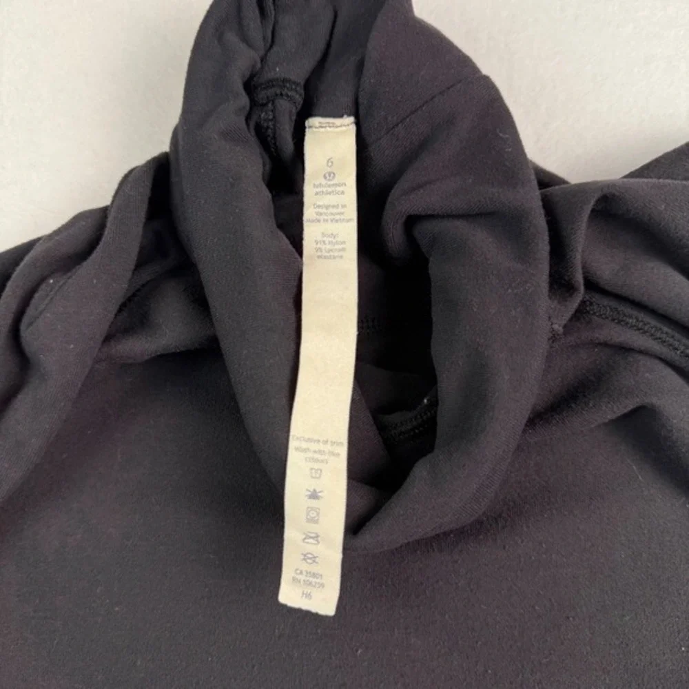 Lululemon Athletica Black Turtleneck Long Sleeve Top‎ Snap Side Slits Size 6